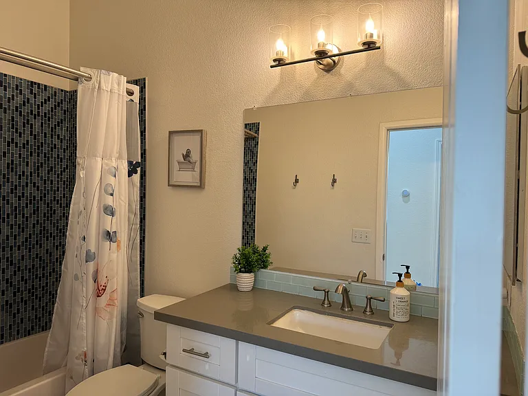 second bathroom with a full tub