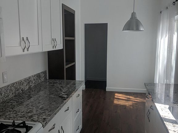 Kitchen, facing side door.