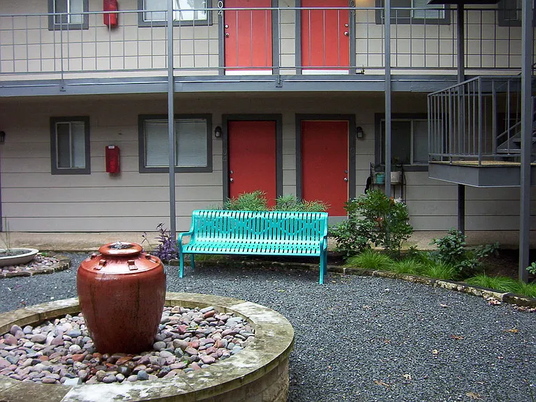 Casa 39 Apartments outdoor common area with fountain
