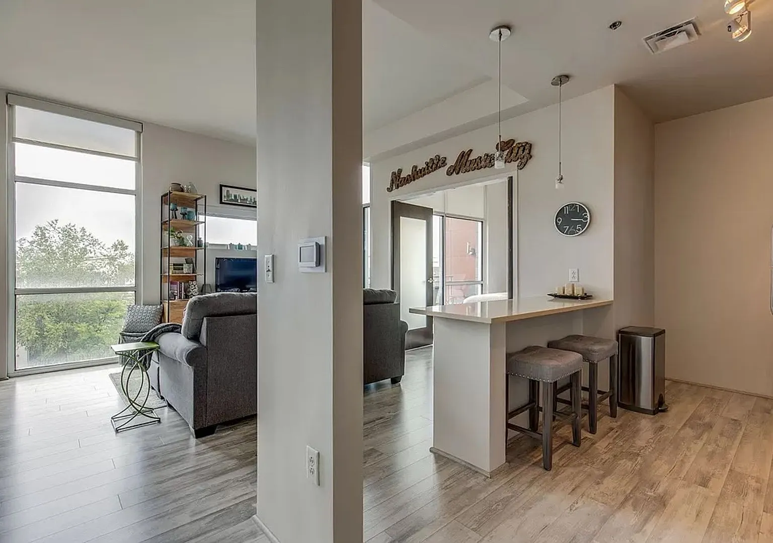 1 Bed/1 Bath Condo at 5th and Main, Assigned Parking, Washer/Dryer/Covered Balcony — Photo 1