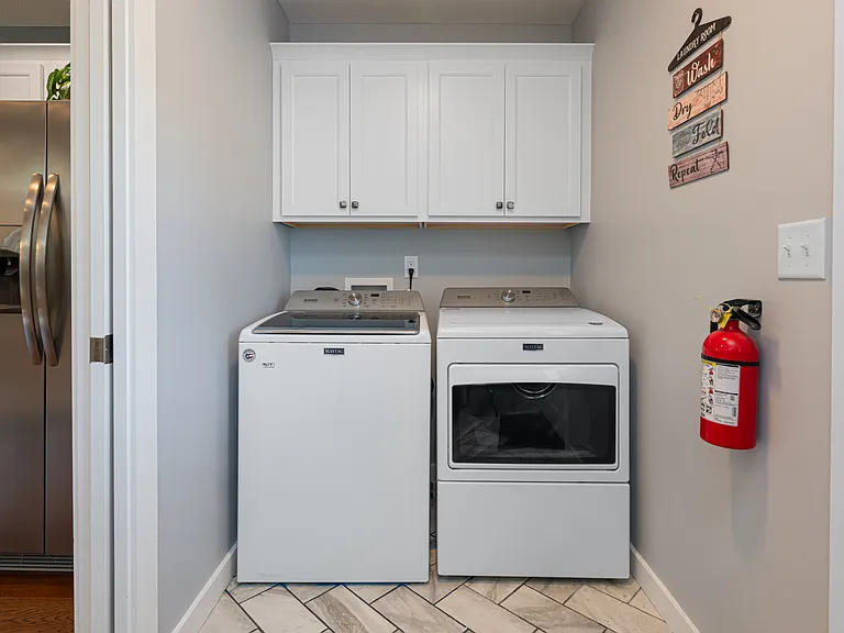 In House Laundry With New Washer & Dryer