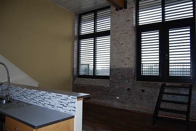 Exposed brick and large windows