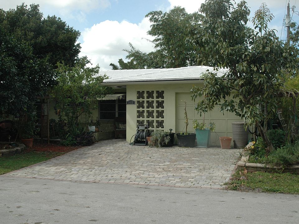 Front of house, fruit trees