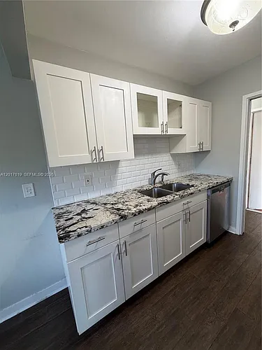 2591 NE 55th Ct #202 Photo 1