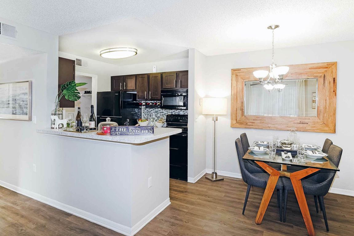 Experience elegant dining and modern kitchen design, perfect for hosting and daily living.