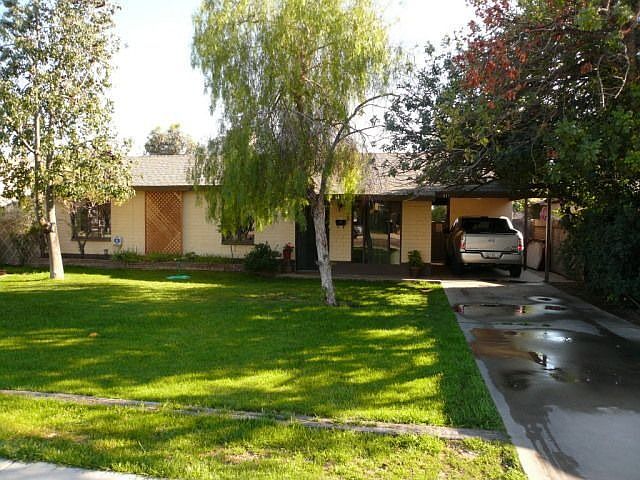 Front of home, lots of shade trees