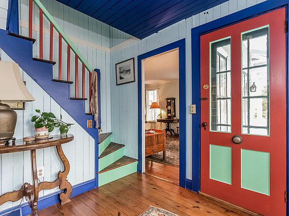 Front entry and foyer with original stairway to the second floor - there is also a back stairway leading to the bedrooms.