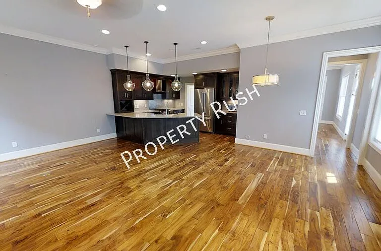 105 E 3rd St — Photo 12
