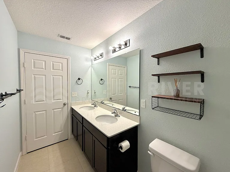 8704 Lake George Cir W — Photo 27