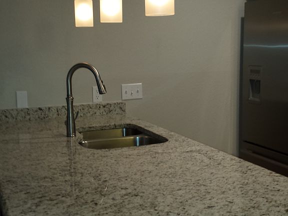 dual basin sink with pull down faucet