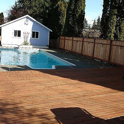 Deck, pool, and pool house