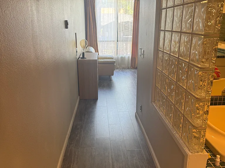 View from entering master bedroom. Master bathroom entrance is on the right side of picture.