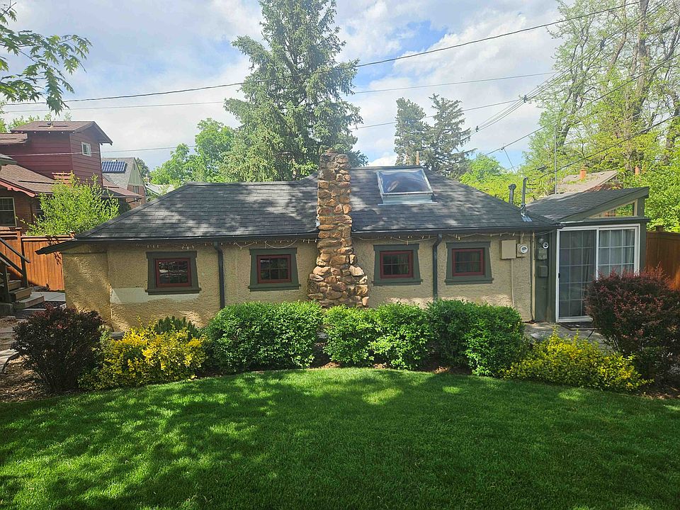 Cottage exterior, showing side view and private patio by sliding door