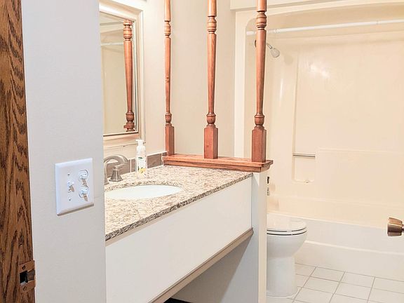 Upstairs bathroom. New tile floor, updated vanity.