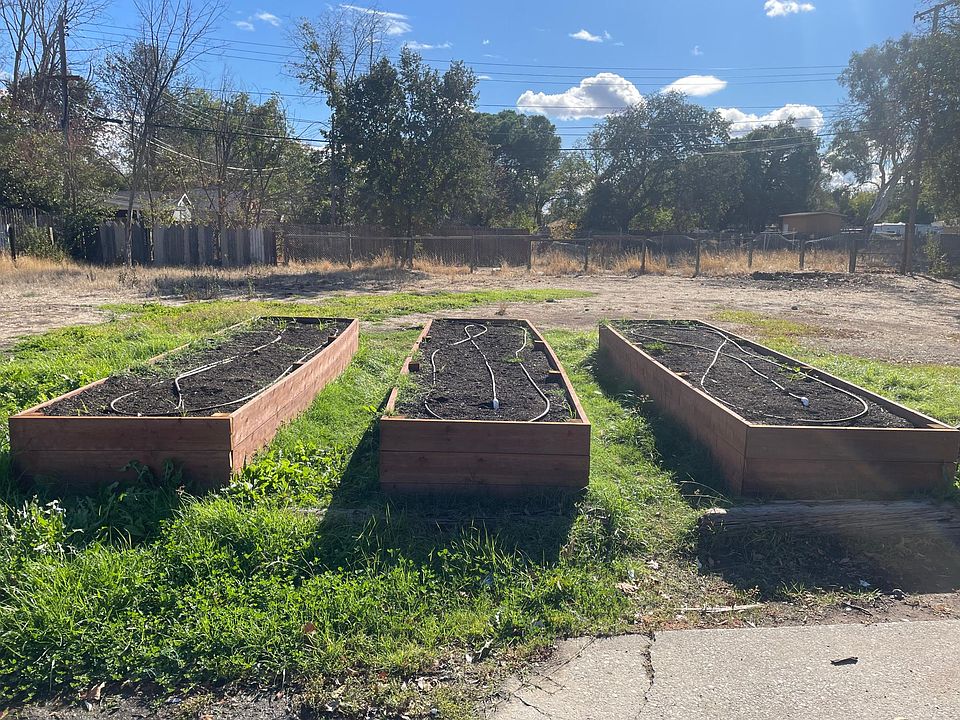 Raised beds with irrigation for gardening.