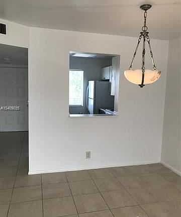 4th image of 8610 N Sherman Cir APT 406