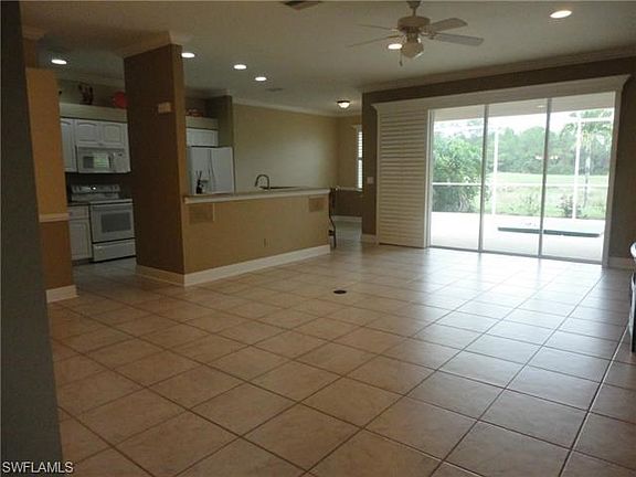 5th image of 8847 Naples Heritage Dr