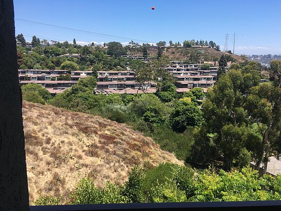 View from living room, balcony, and master bedroom.