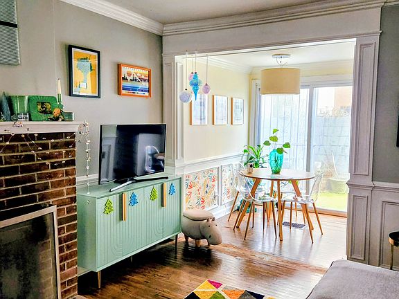 Living room with light and airy dining area