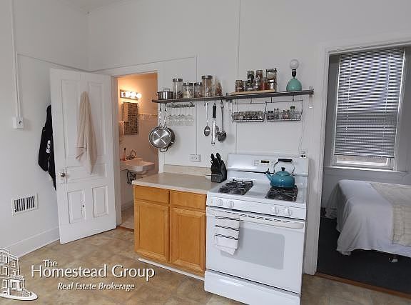 3rd image of 1114 N Winchester Ave #2REAR