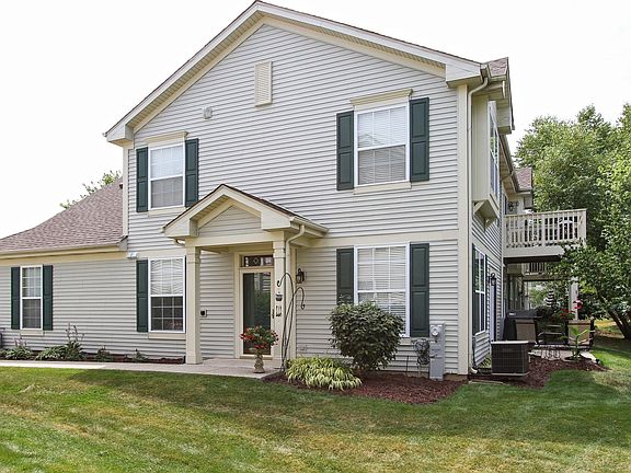 Exterior side features cement sidewalk to your entryway.