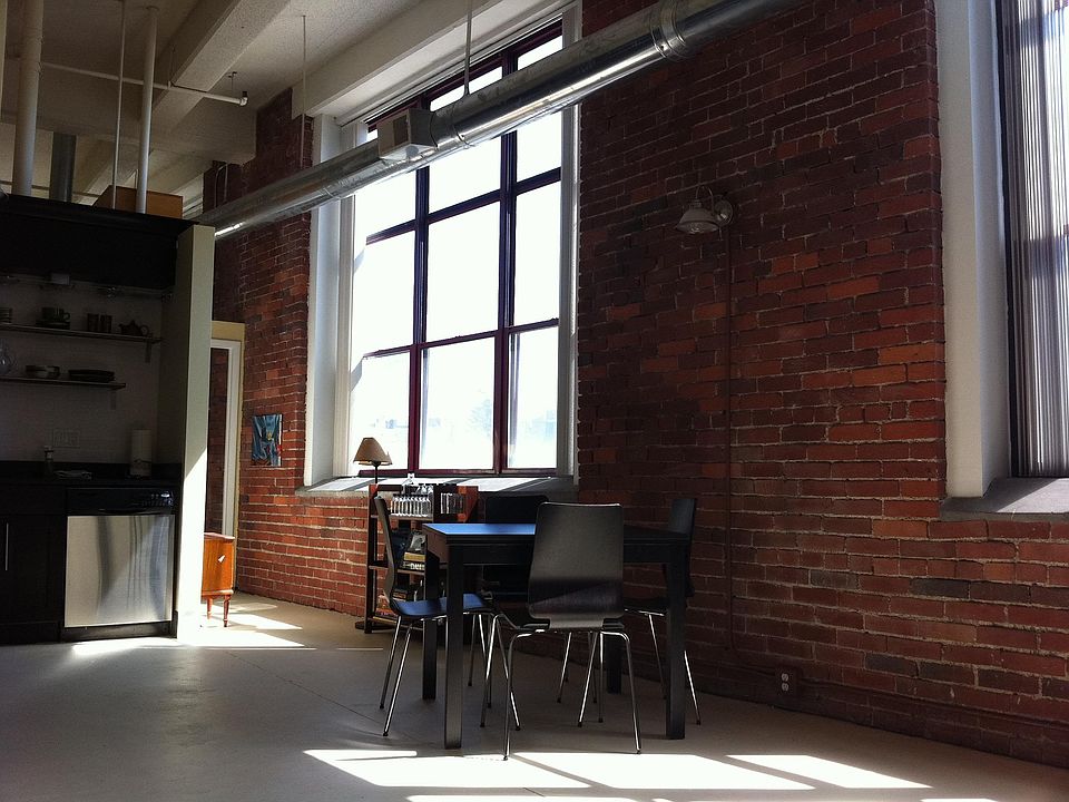 14' high exposed brick wall