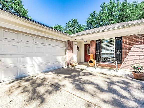 Approaching the front door you will see the beautiful brick elevation and covered front porch!