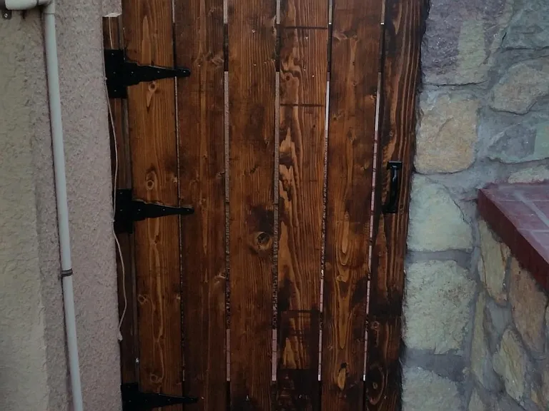Property features double lockable gates on both sides of the home.