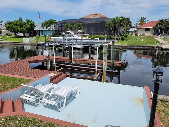 view of dock and boat lift