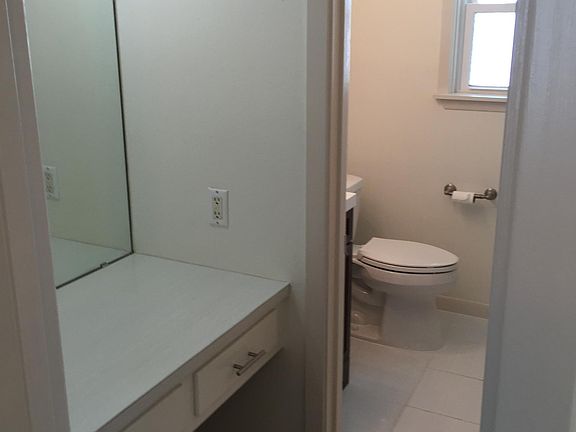 Dressing area and bath to second bedroom
