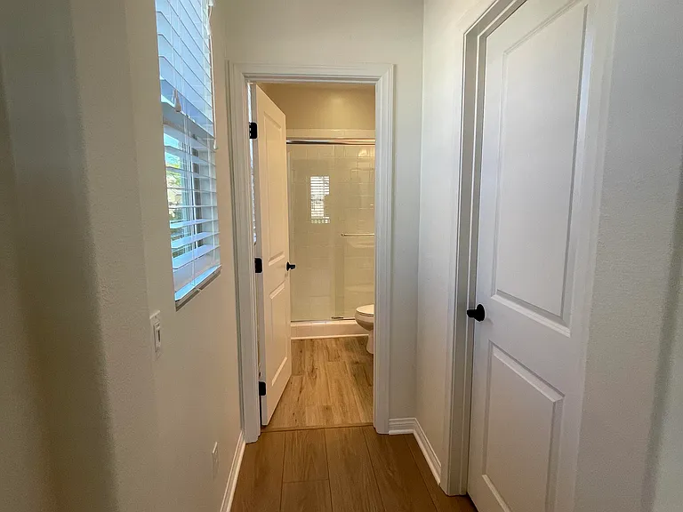 Main Floor Guest Bedroom Hallway to Bathroom.