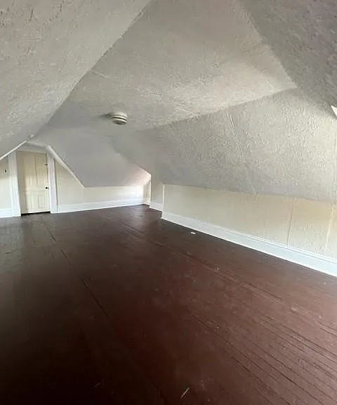 Use this HUGE finished attic as a 3rd bedroom or anything you think of.