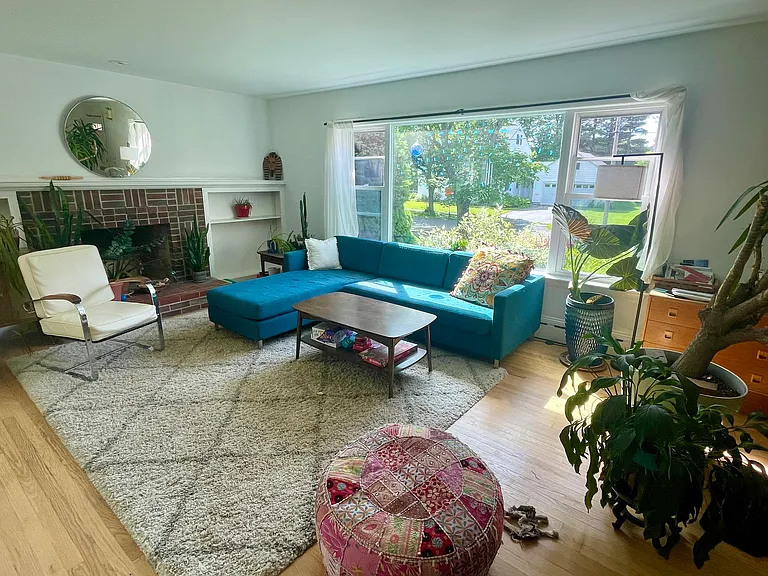 Living room area of open concept main floor.