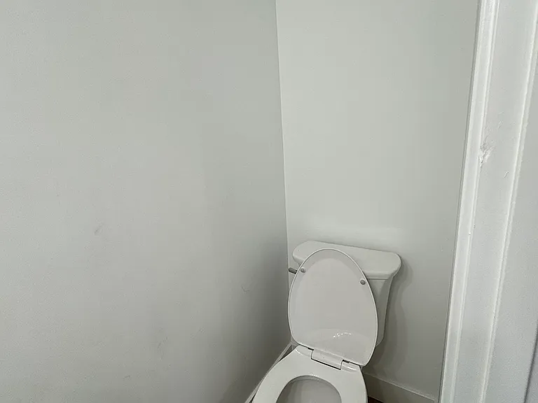 (1st floor) First floor half bathroom next to the kitchen