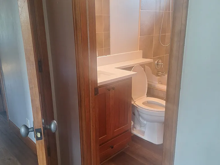 Private full bathroom in rear master.