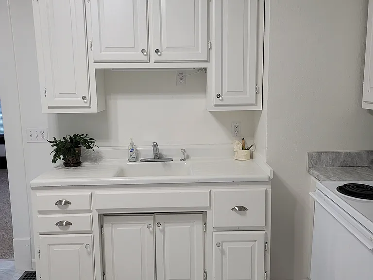 Farmhouse kitchen with sideboard sink.