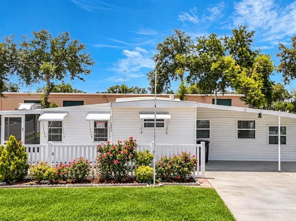 39032 OLA AVENUE, ZEPHYRHILLS, FL 33542