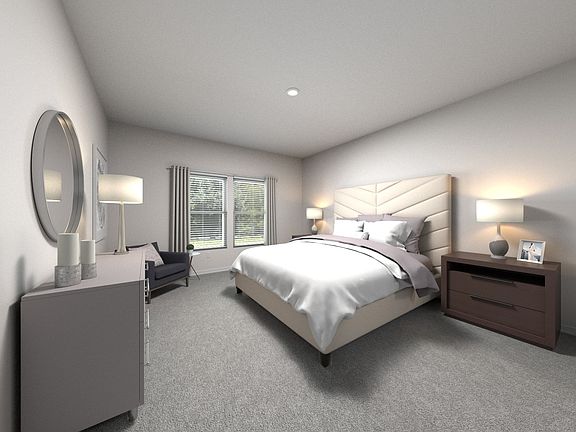 The primary bedroom offers a private retreat.