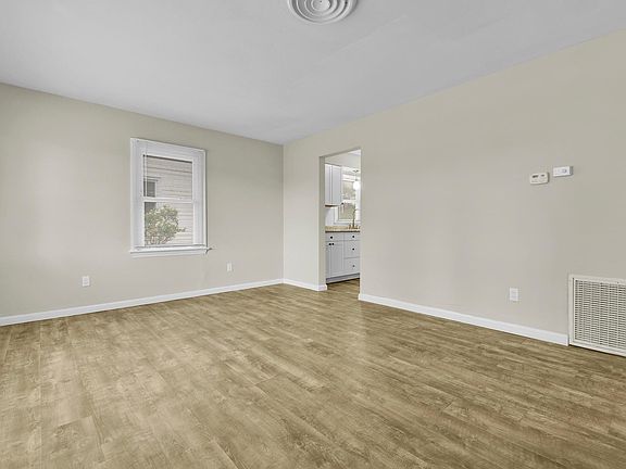 Living room as you walk in front door.