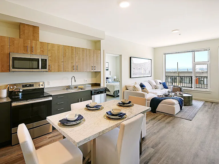 Experience coastal living in style with this open-concept space featuring ocean views and modern finishes.