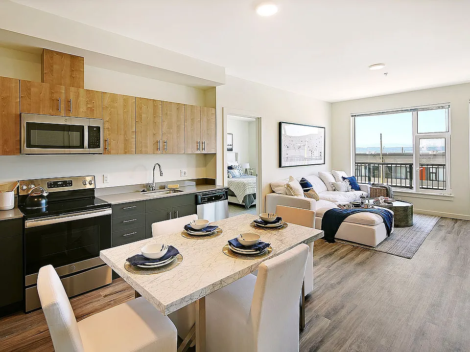Experience coastal living in style with this open-concept space featuring ocean views and modern finishes.