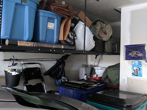 8' x 4' overhead storage racks. Holds up to 600lbs.