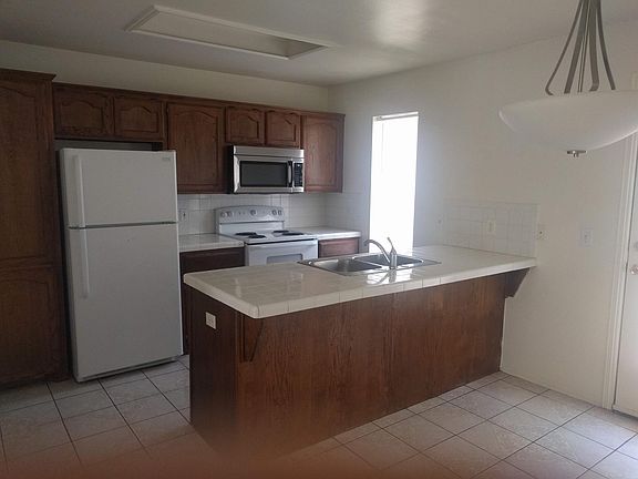 Kitchen, which has a pantry.