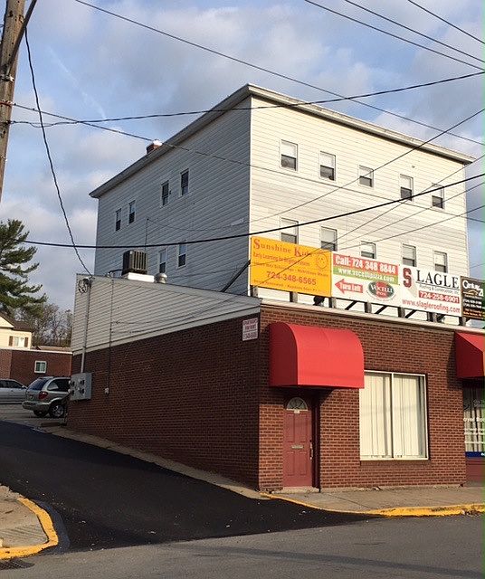 Front Entrance (Red Awning)