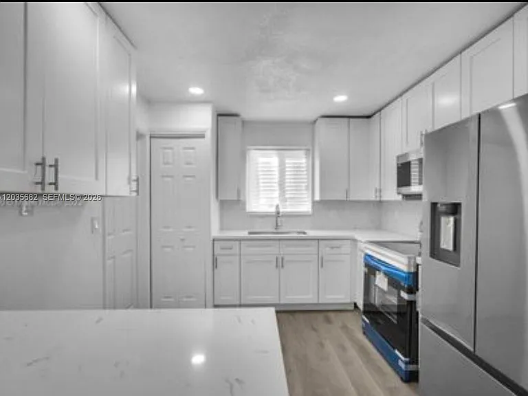 3811 NW 6th Pl — Photo 7