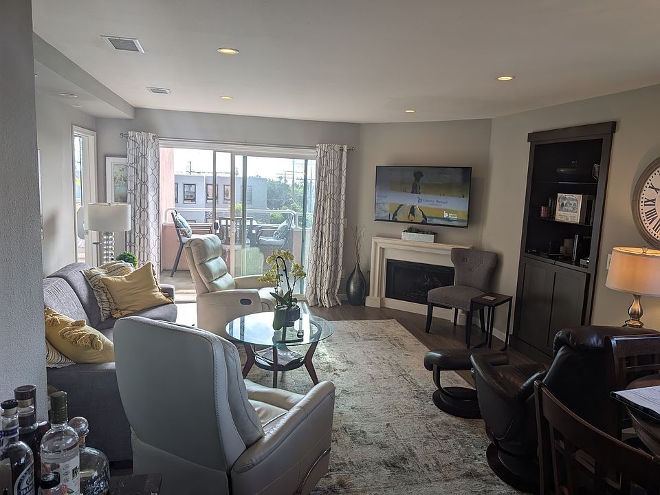Living room with HD tv and fireplace