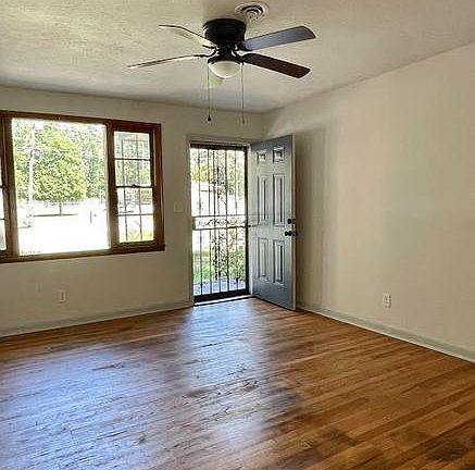 Main living room open to dining area.