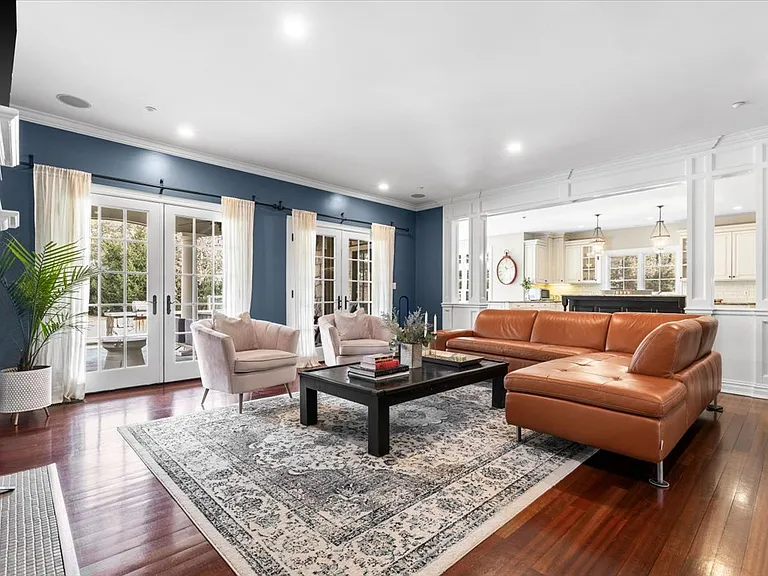 Family Rooms with French Doors to covered stone patio