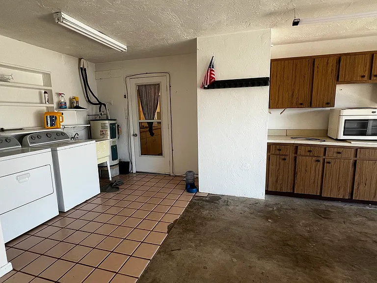 Microwave and full wall cabinets