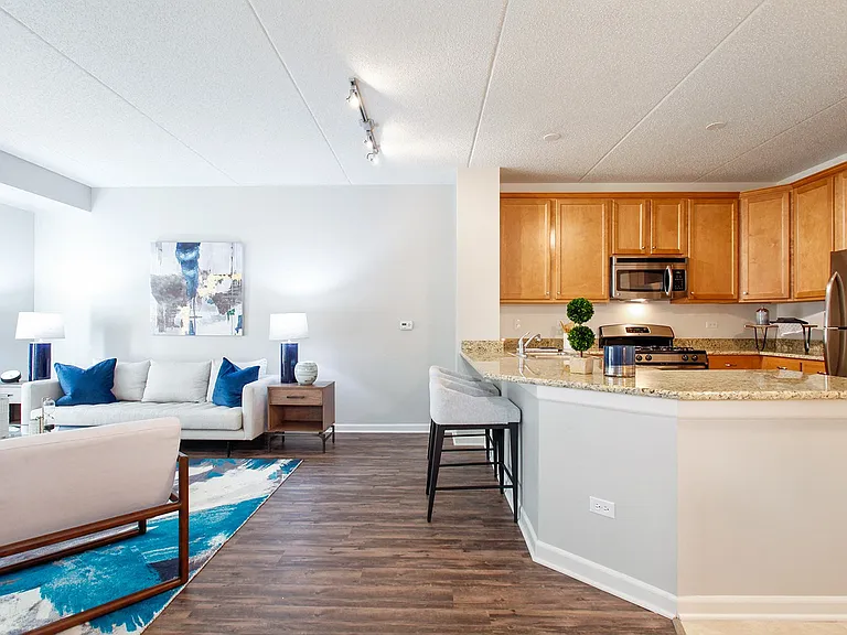 Bright living space connected to kitchen area